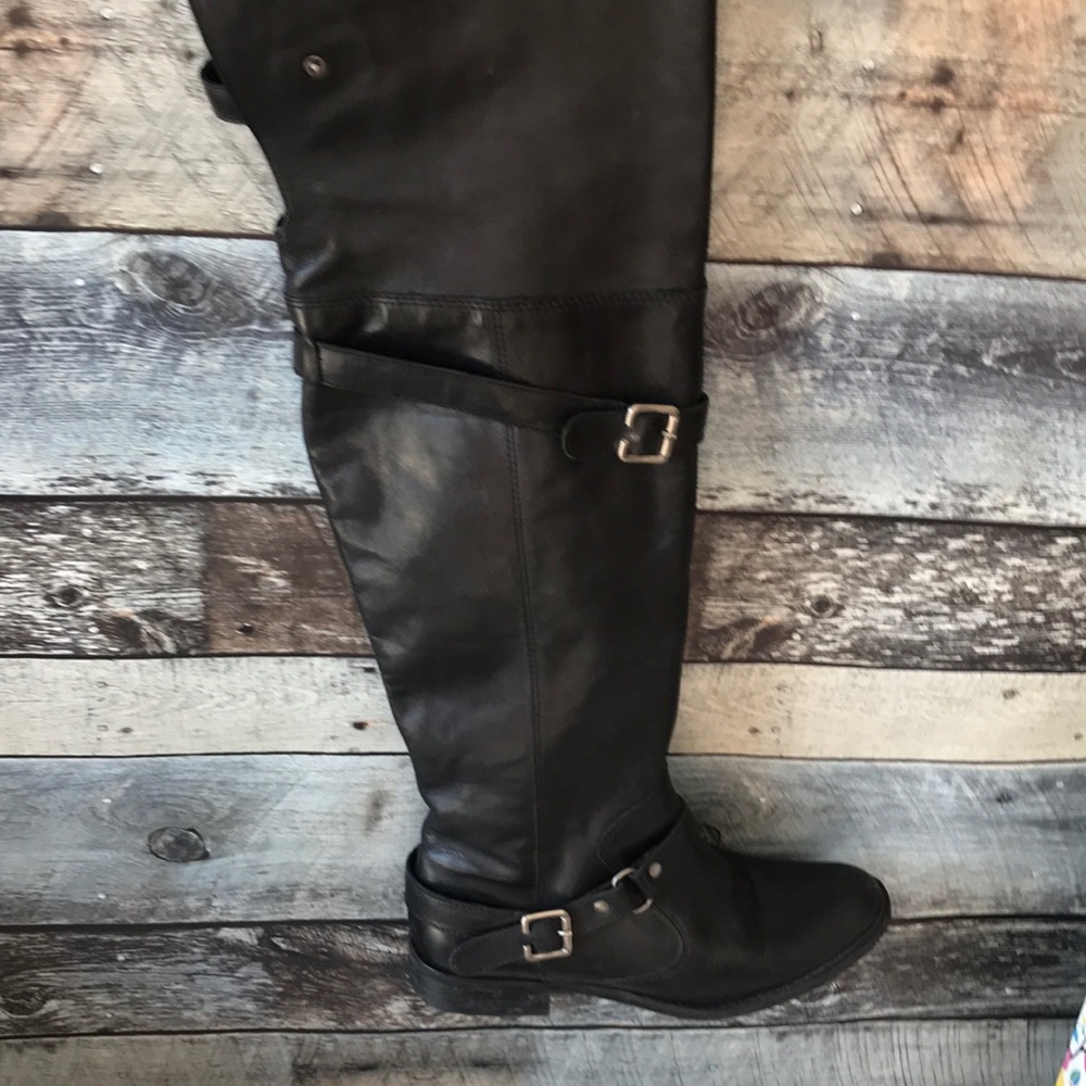 Tall black leather boots